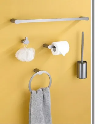 Chrom bathroom hardware set on a yellow wall - A166 collection