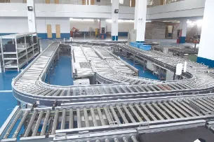 Automatic sorting conveyor